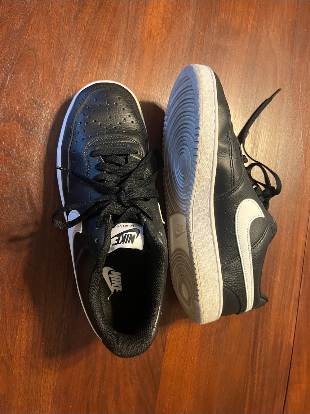Nike Black and White Low-Top Sneakers with White Swoosh